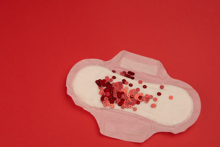 feminine pad blood menstruation hygiene red background