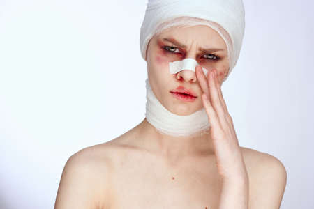 a person plastic surgery operation bare shoulders light backgroundの写真素材