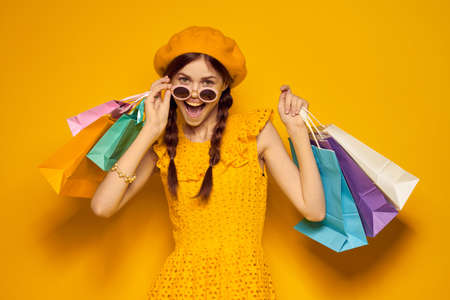 cheerful woman shopping entertainment lifestyle isolated backgroundの写真素材