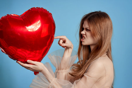 beautiful woman Birthday party gift heart balloon blue background