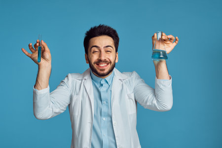laboratory assistant in a white apron analyzes diagnosticsの写真素材