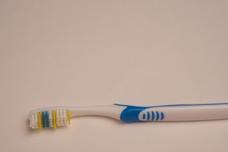 bathroom items hygiene care toothbrush light background