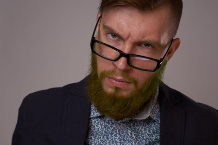 business man with glasses with tattoos on his arms office professionals