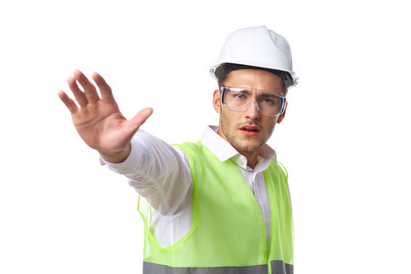 engineer in working uniform protective clothing documents construction
