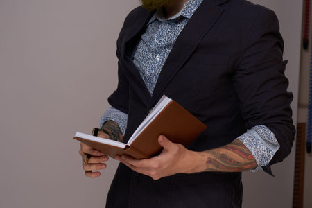 business man with a book in his hands job manager professionals