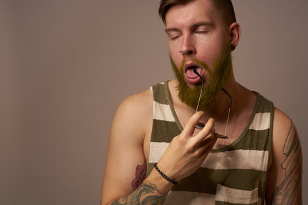 brutal man tattoos on his arms posing lifestyle form cropped viewの写真素材