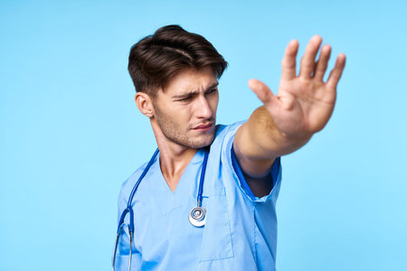 man in medical uniform patient treatment hospital medicine blue background