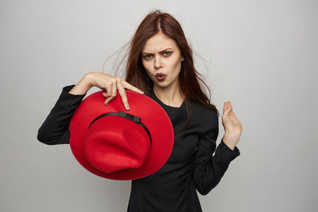 woman with red hat witch posing horror halloweenの写真素材