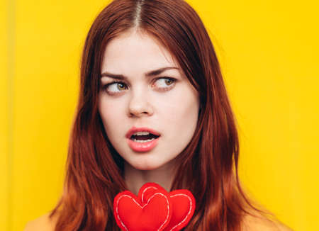 pretty woman in yellow shirt glamor romance posingの写真素材