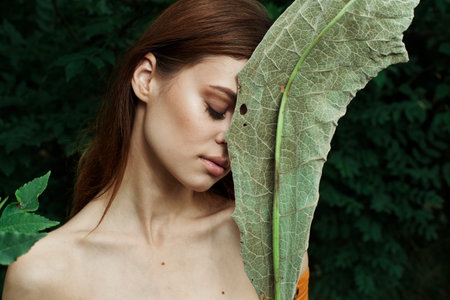 pretty woman Cosmetology nature green leaves glamor cropped view