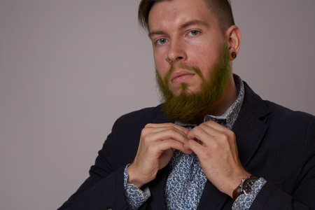 bearded man in jacket posing fashion Professionalの写真素材