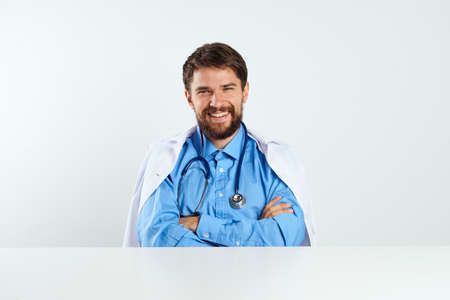 laboratory assistant sitting at his desk experiment analyzes medicineの写真素材