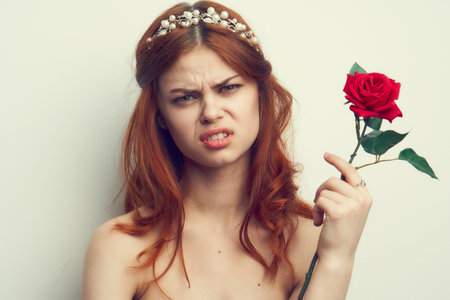 attractive woman with rose flower makeup romance modelの写真素材