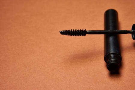 makeup brushes mascara accessories glamor brown backgroundの写真素材