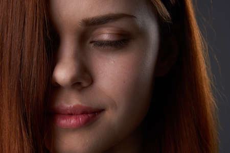 pretty woman face closeup makeup brush glamorの写真素材