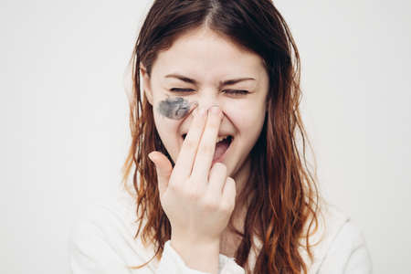 redheaded woman face cream skin care rejuvenationの写真素材