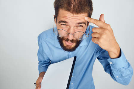 business man in blue shirt documents manager office professionalの写真素材