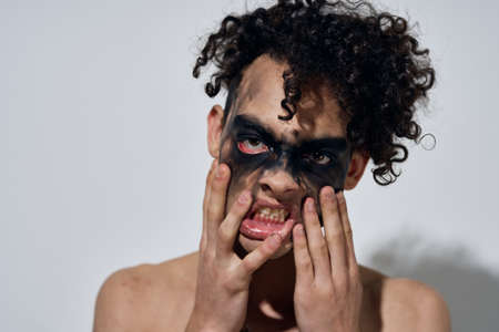 man in black mask halloween horror ghost dark backgroundの写真素材