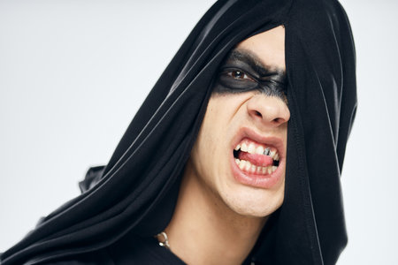 man in black mask halloween horror ghost dark background