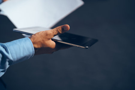 business man with documents in blue shirt managerの写真素材