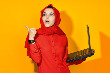 Muslim laptop posing technology internet isolated background