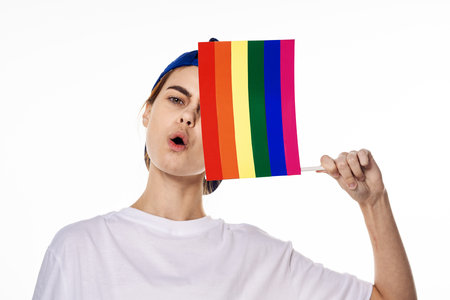 woman wearing white t-shirt lgbt flag inventor community