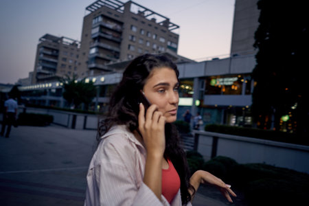 pretty woman with phone in hands communication walk lifestyle