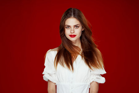 pretty woman fashionable hairstyle posing red lips isolated background