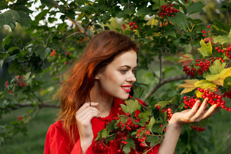 Woman in red shirt plants berries nature summer