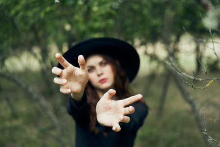 witch in the woods posing costume halloween gothic styleの写真素材