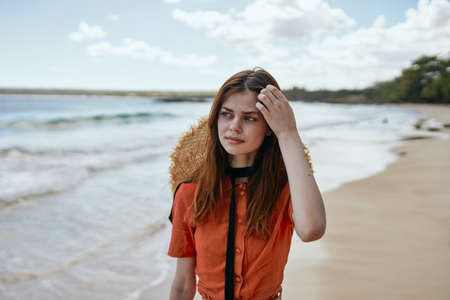 woman by the ocean beach start island landscape paradiseの写真素材