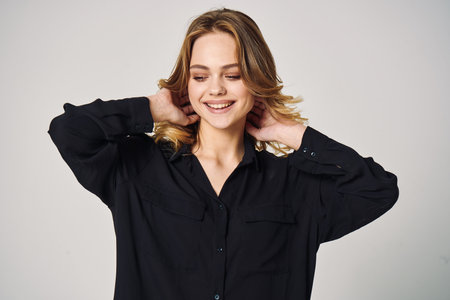 pretty woman in black shirt posing glamor model