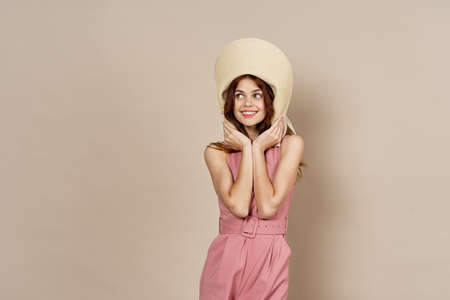 woman in pink dress glamor posing model isolated backgroundの写真素材