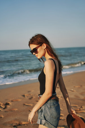 pretty woman on the beach summer vacation lifestyle sun