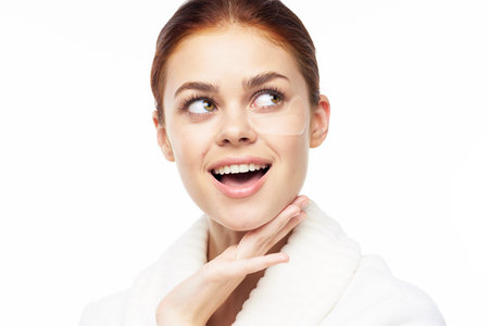 pretty woman in white robe face skin care collagen