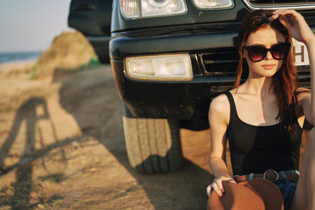 woman in sunglasses near car travel summer vacation landscape
