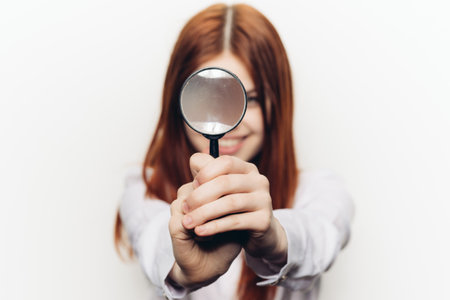 cheerful woman in white shirt pump in hands search tool