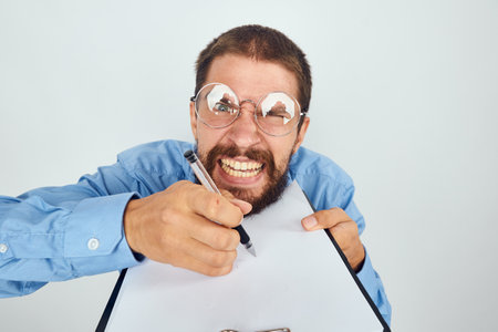 emotional man in blue shirt manager work funの写真素材