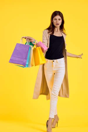 smiling woman shopping entertainment lifestyle studio modelの写真素材
