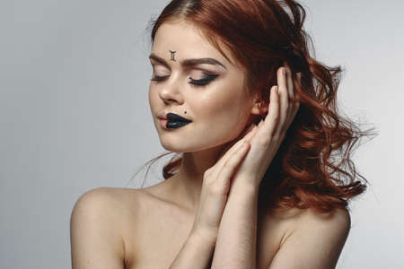woman with bare shoulders zodiac sign gemini horoscope astronomyの写真素材
