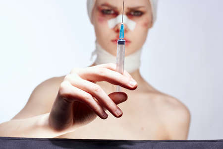 emotional woman health problem injury face injection isolated backgroundの写真素材