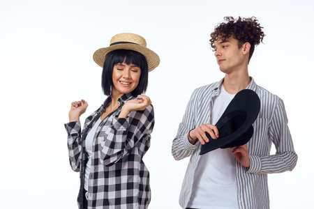 young couple modern clothes posing fun friendshipの写真素材