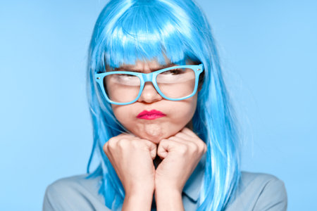 beautiful woman in blue wig glasses fashion glamorの写真素材
