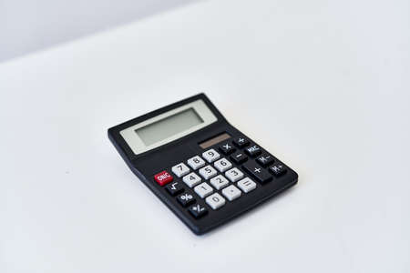 wireless keyboard on desktop cup documents officeの写真素材