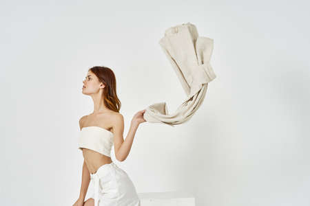 pretty woman in white dress posing summer style glamorの写真素材