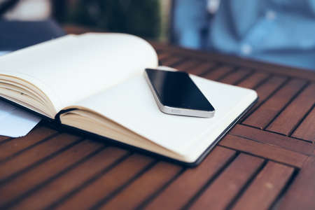 book on the table accessories work lifestyle outdoorsの写真素材