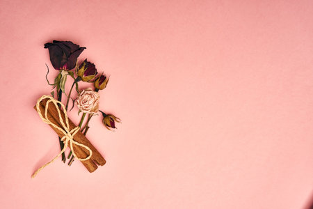 flowers decoration cinnamon pink background top view
