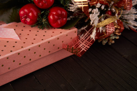 christmas toys holiday decoration gifts garland wooden backgroundの写真素材