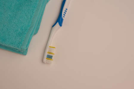 bathroom items hygiene care toothbrush light backgroundの写真素材