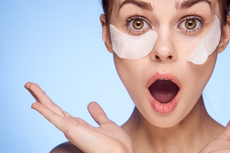cheerful woman with bare shoulders clean skin cosmetology beauty